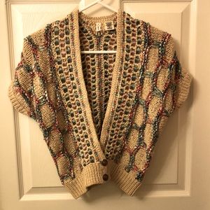 Cotton polyester nylon shrug with varied coloured ribbon ornamentation 2 buttons